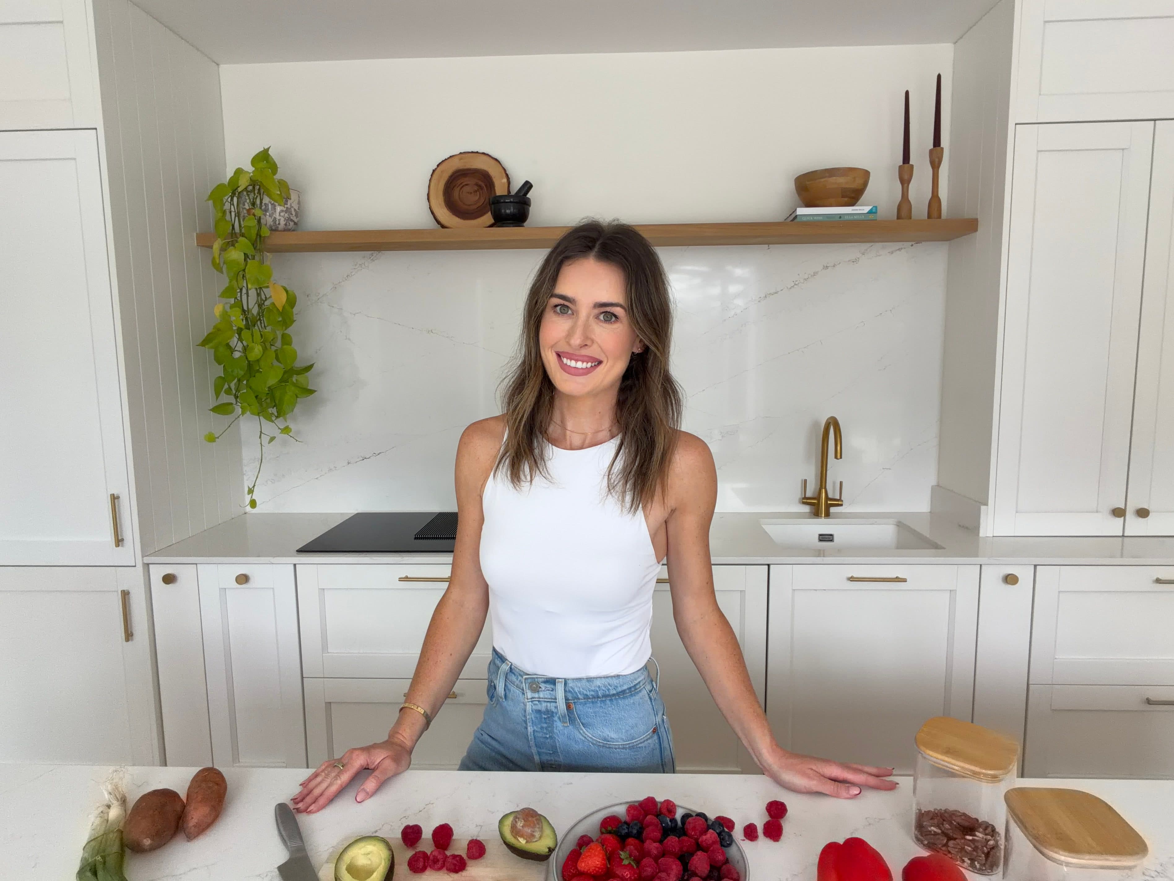 Amy Kahlout preparing food in her kitchen